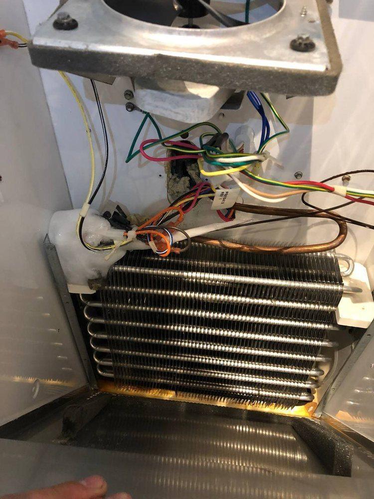Inside a Sub-Zero — evaporator coil and sealed system